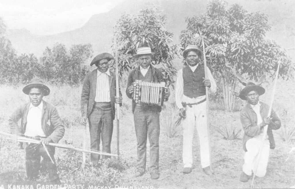 South Sea Islanders at a garden party near Mackay, ca. 1900.
