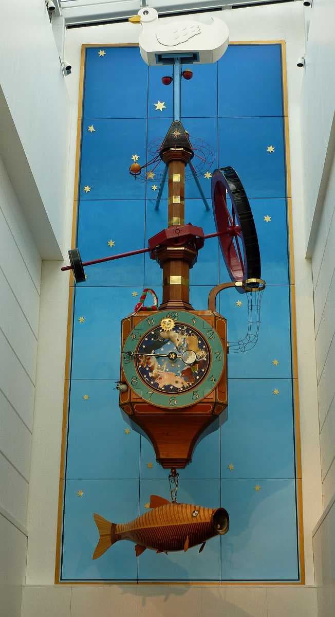The mechanical clock in the Regent Shopping Arcade, designed by Kit Williams. The distance from the duck to the fish is 14 metres.