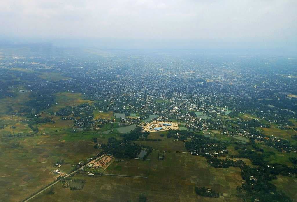 Aerial view of agartala, mainly showing the parts of Ramnagar and the Integrated Check Post (ICP)(white landmark) beyond that point is the Indo-Bangla border showing the territory of Bangladesh(paddy field)
