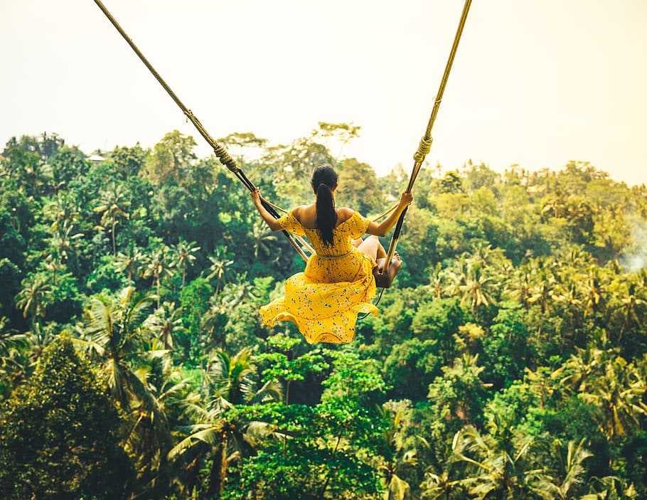 Swinging into the green forestation at Aloha Ubud Swing