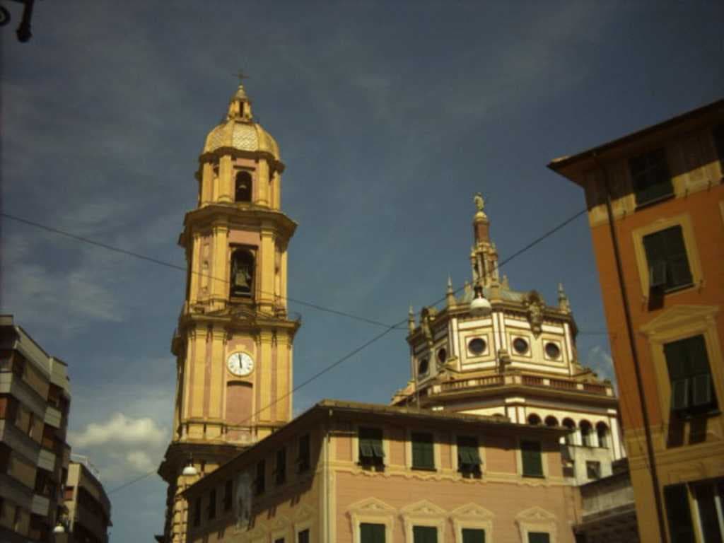Bell tower and dome of the basilica of San Gervasio e Protasio.