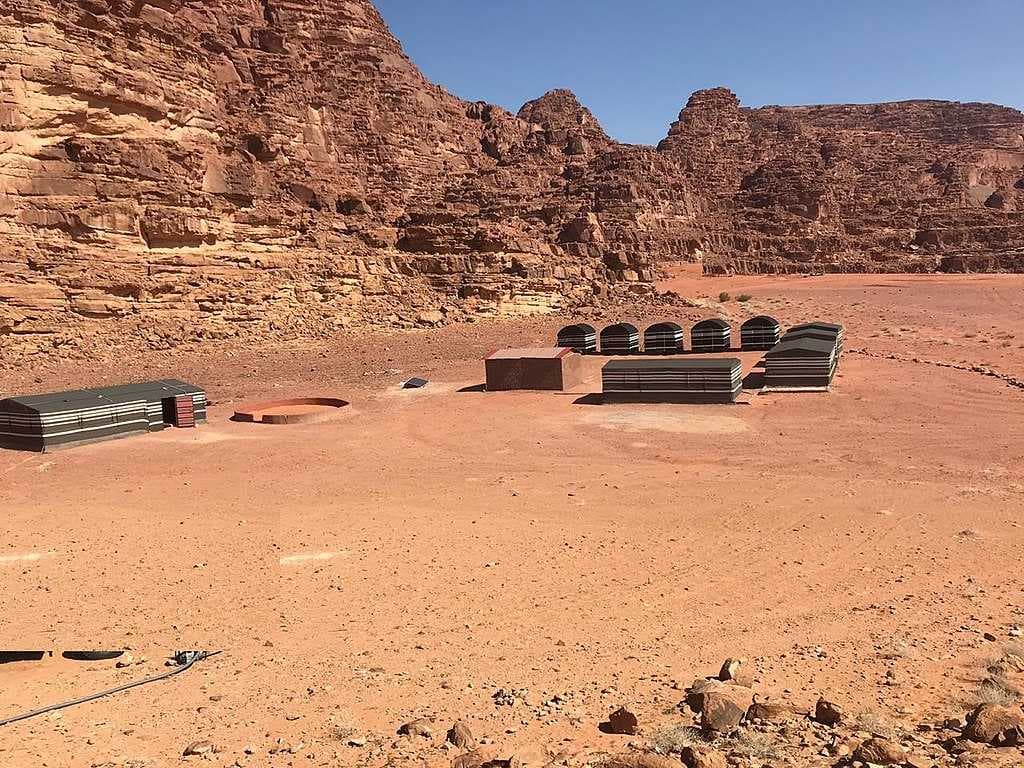Secluded camp protected by mountains
