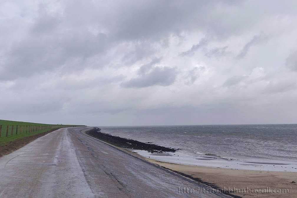 A beach next to the highway