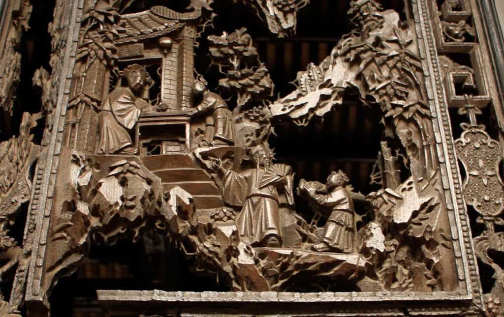 Wood carvings on screen doors (close up)