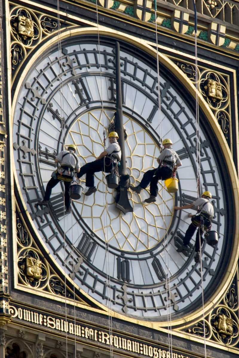 The south clock face being cleaned on 11 August 2007