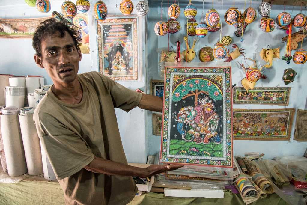 An artist showing his work.