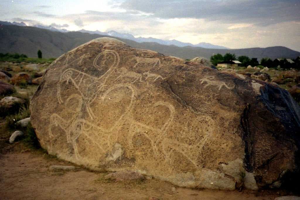A boulder-strewn slope at Cholpon-Ata has numerous examples of petroglyphs, some showing people hunting animals which are now extinct or scarce in the area