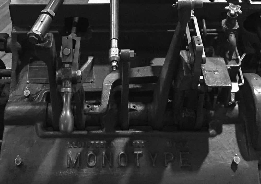 Equipment used for making paper on display in the factory.