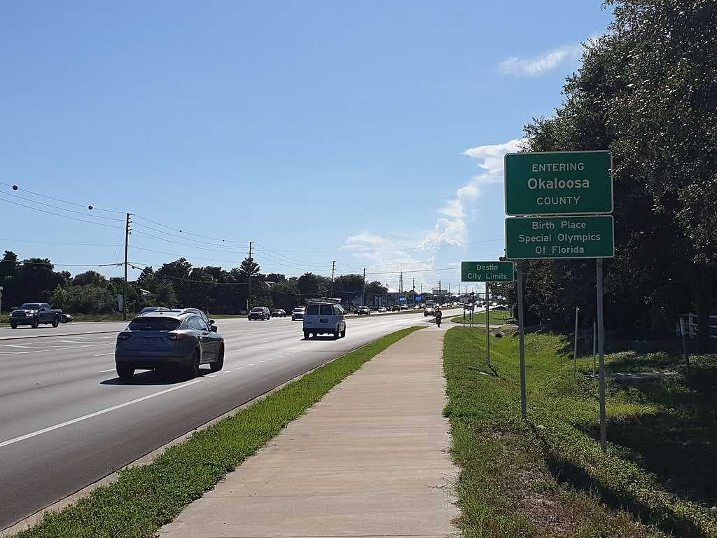 Several road signs at Destin City boundary.